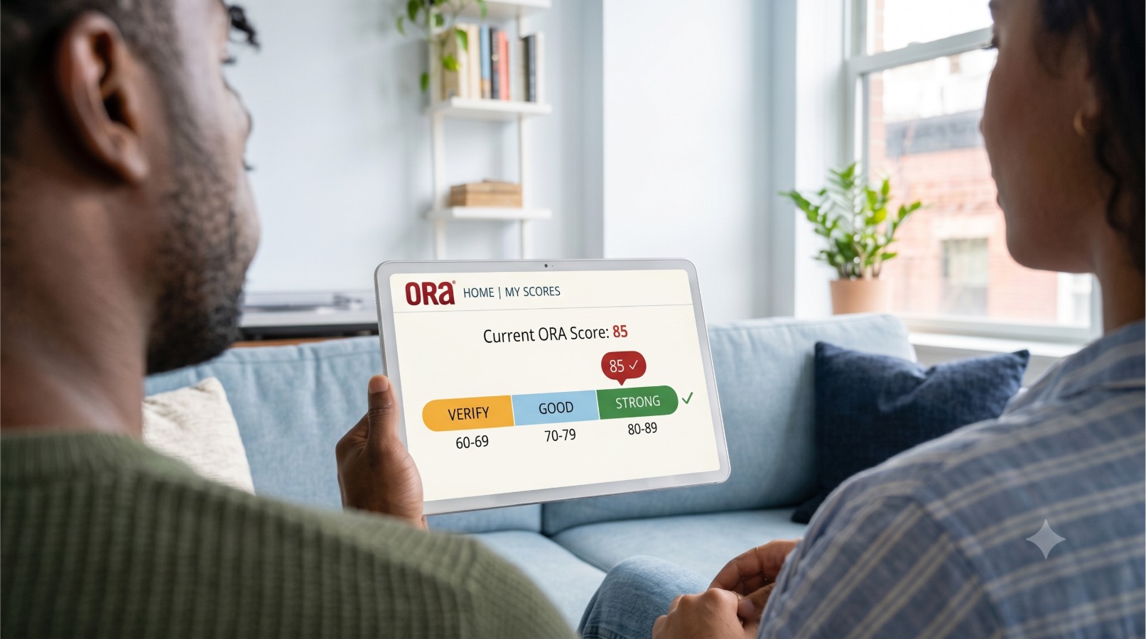 View of person on a couch viewing a tablet