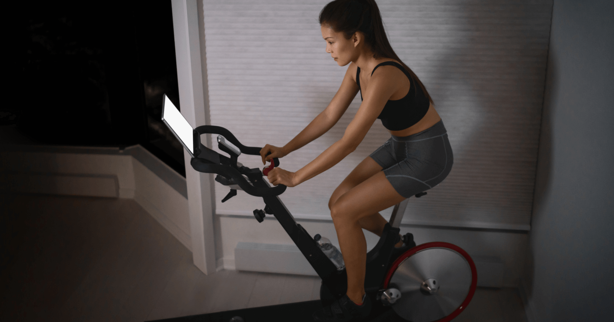 woman on peloton bike