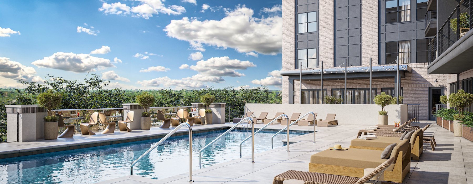 resort style pool with seating and a building behind