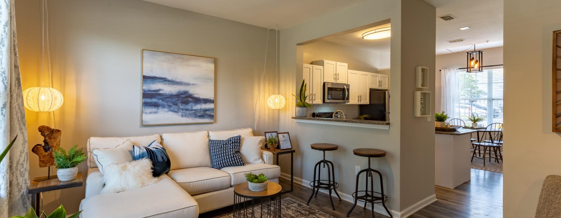 a living room with a couch and a table