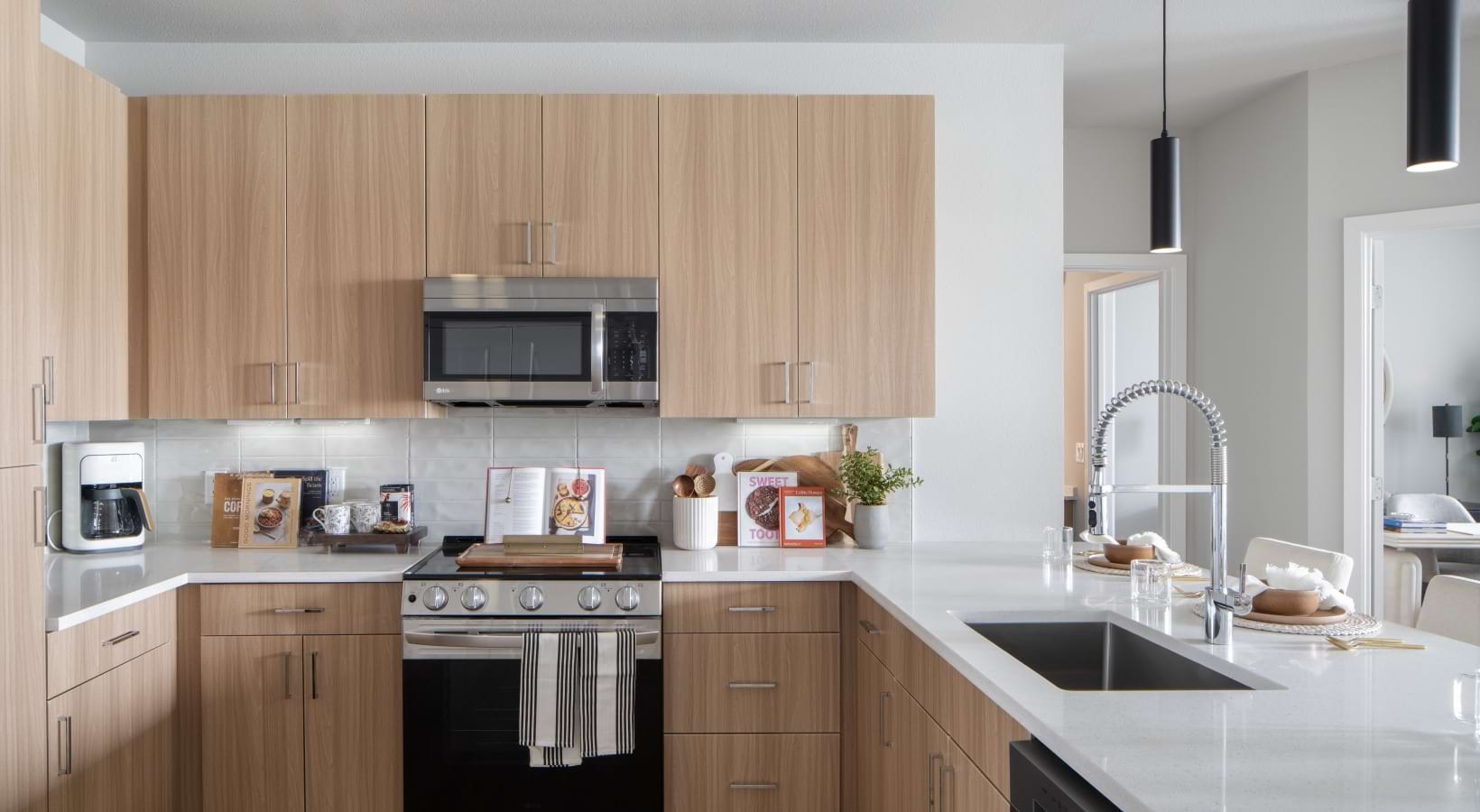 kitchen with white counters and ample cabinets