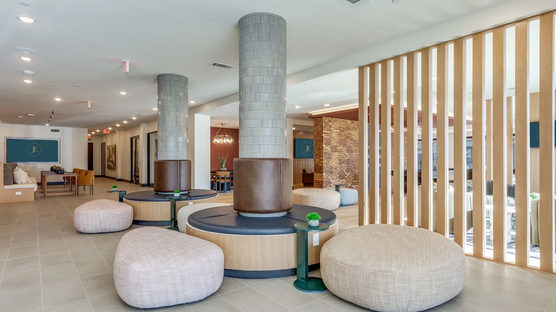 Modern lobby area with stylish seating and warm lighting.