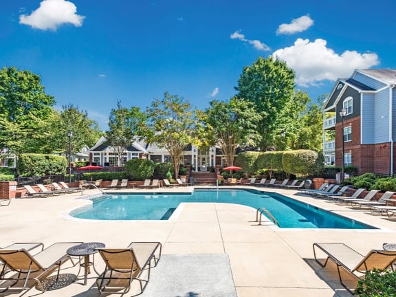 Poolside Relaxing Area at The Village Apartments, North Carolina
