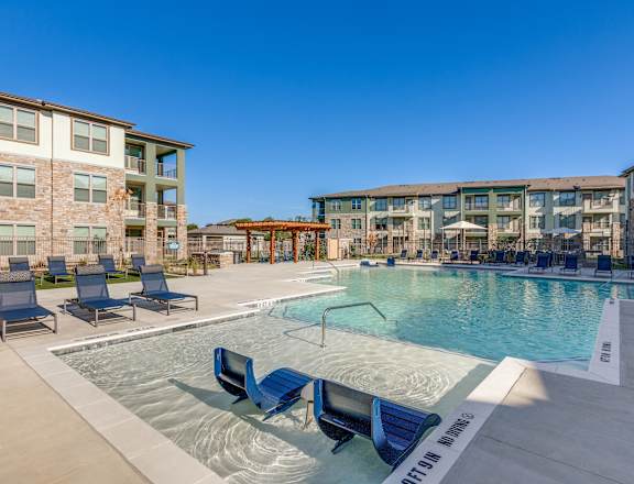 our apartments have a resort style pool with lounge chairs
