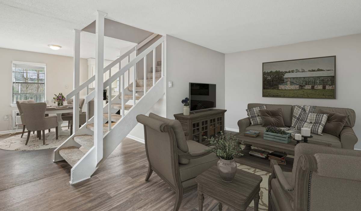 Living room with modern furnishings at Vesta Creeks Run in North Charleston, South Carolina