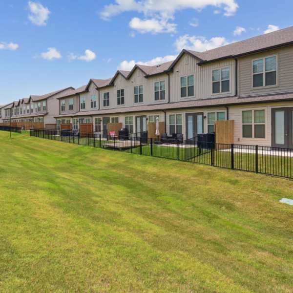 Townhome fenced-in backyards at Caliza at the Loop