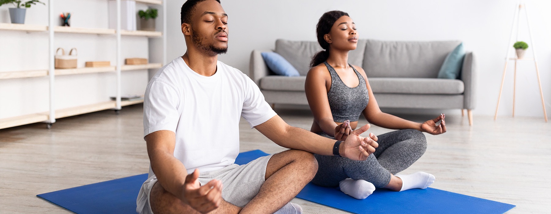 a couple meditating