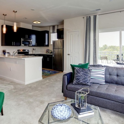 a living room with a couch and a table
