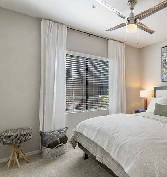 a bedroom with a bed and a ceiling fan at Element Deer Valley in Phoenix, AZ 85027