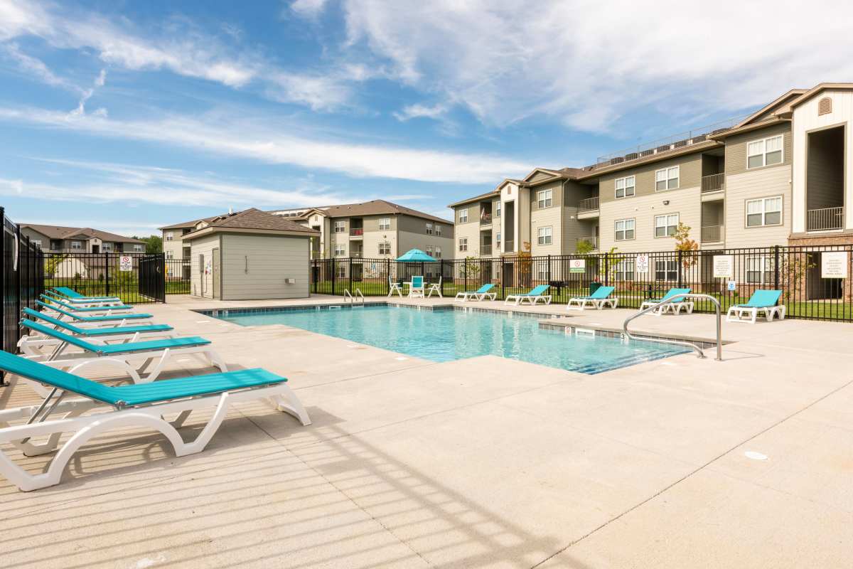 Swimming pool with lounge chairs at Jefferson Green in Louisville, Kentucky
