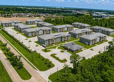 A large group of houses are shown from an aerial view.