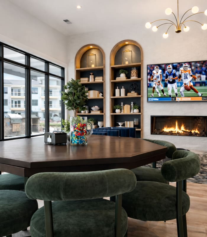 Resident lounge with fireplace Cypress Point in Mooresville, North Carolina.