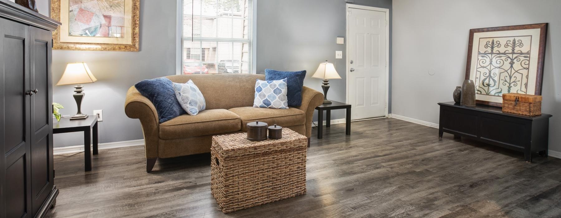 a living room with a couch and a basket