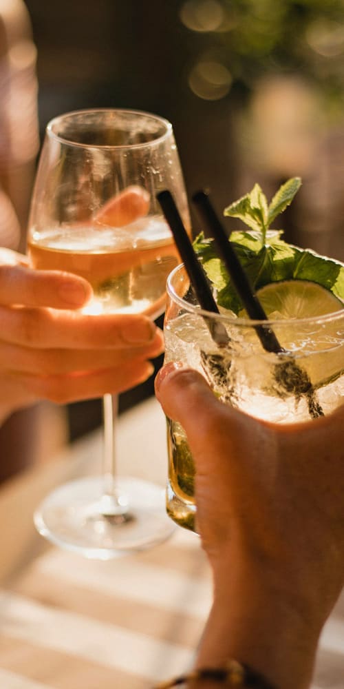 Residents enjoying refreshing drinks at a nearby restaurant 