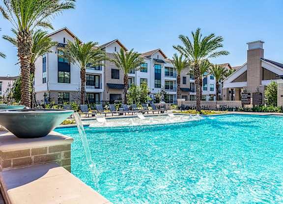 Blue Cool Swimming Pool at Alys Crossing Apartments, Cypress, TX