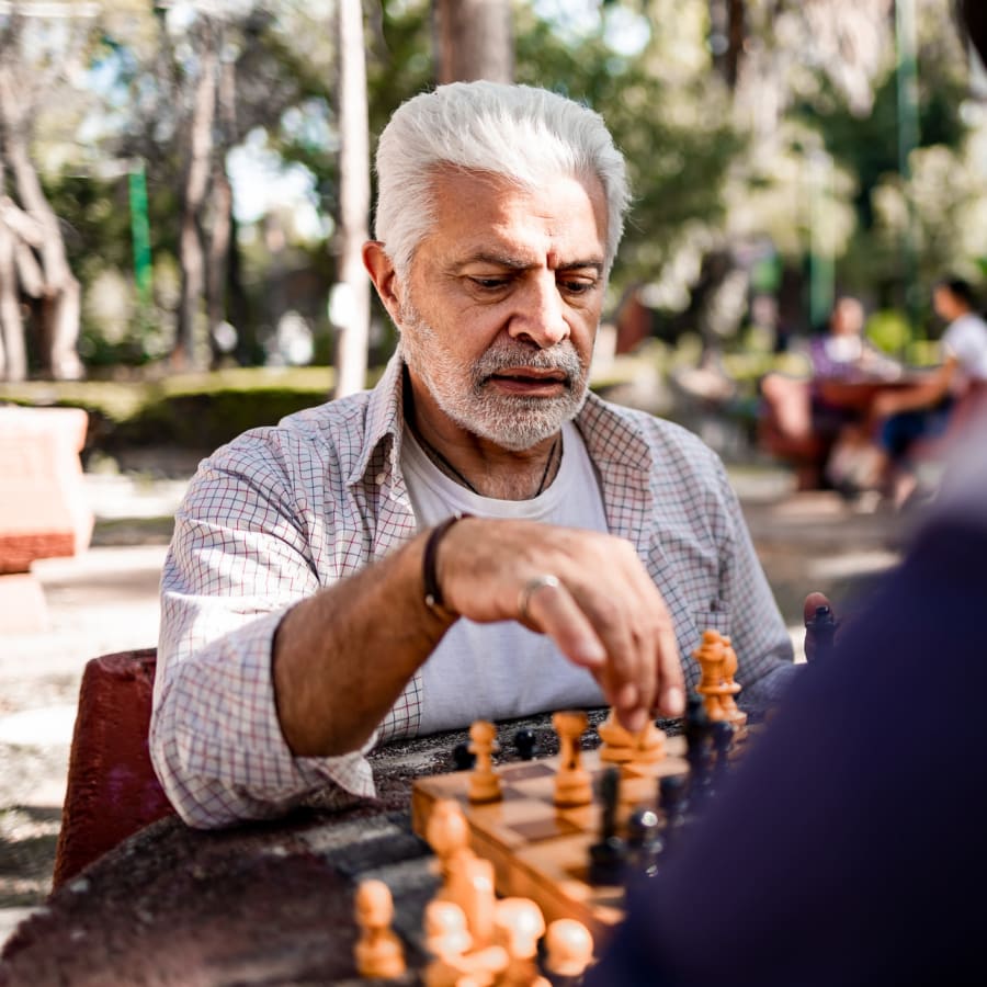 Resident playing chess near The Joyce in Durham, North Carolina