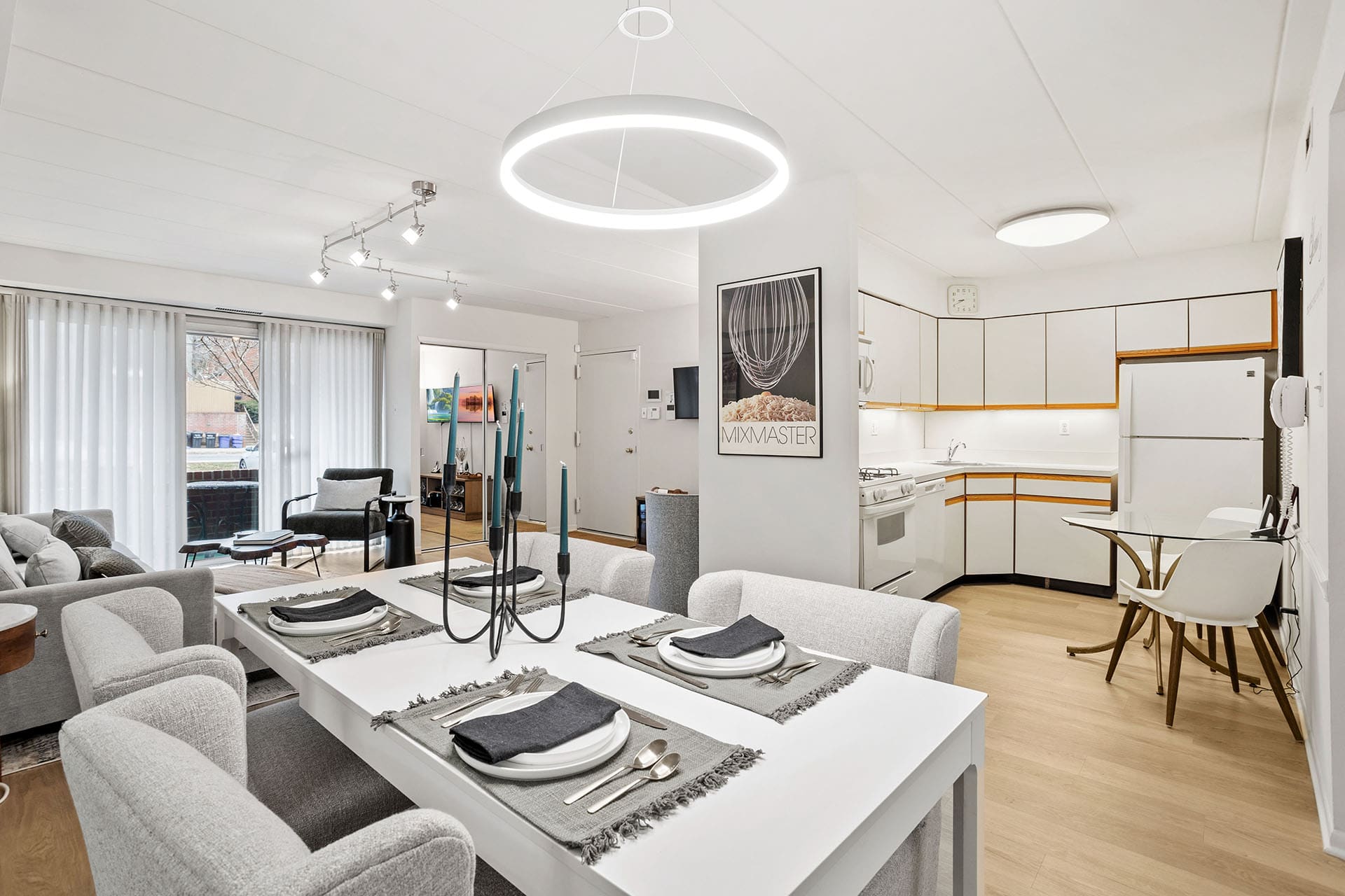 Park Place One apartment interior dining area, kitchen, and living room