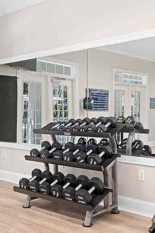 Spin Room with two bikes and tv Flats at Sweetgrass Landing, Mount Pleasant, South Carolina