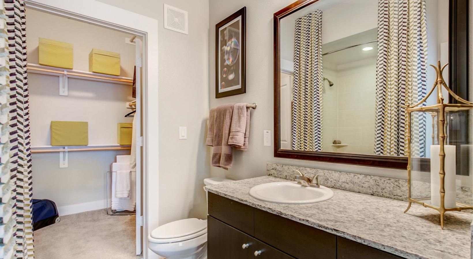a bathroom with a large mirror
