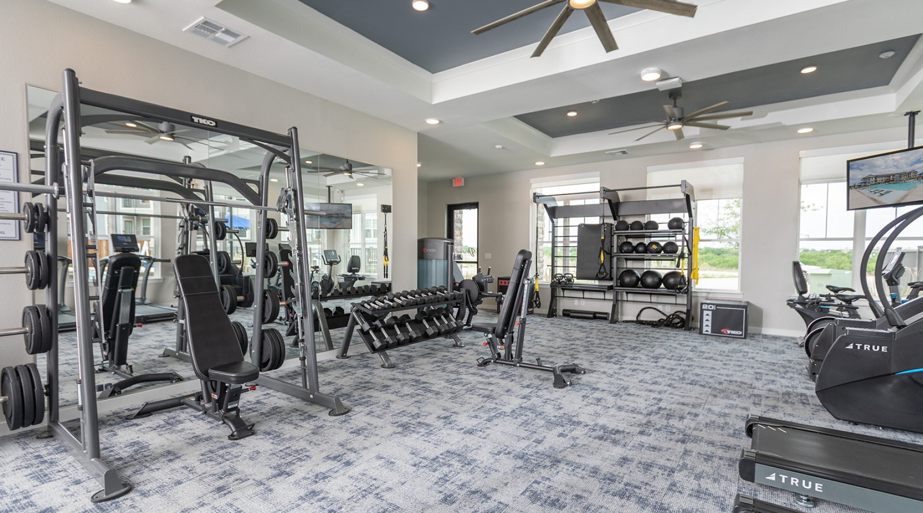 fitness center with exercise equipment
