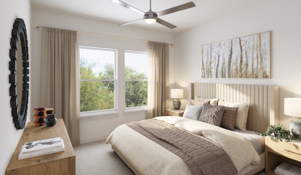 a bedroom with a bed and two nightstands