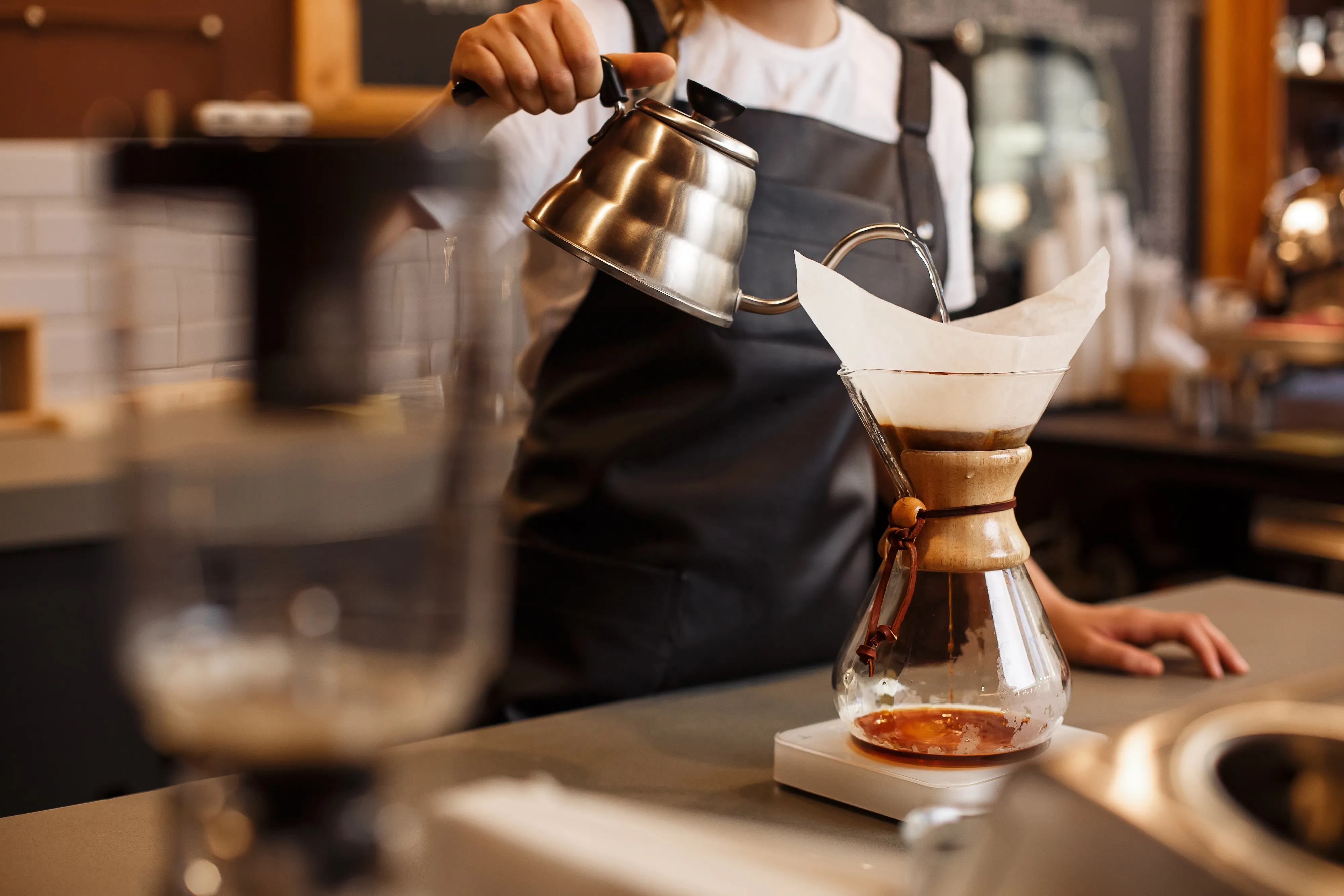 person pour coffee stock image