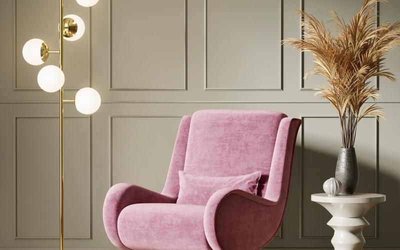 a pink chair in a room