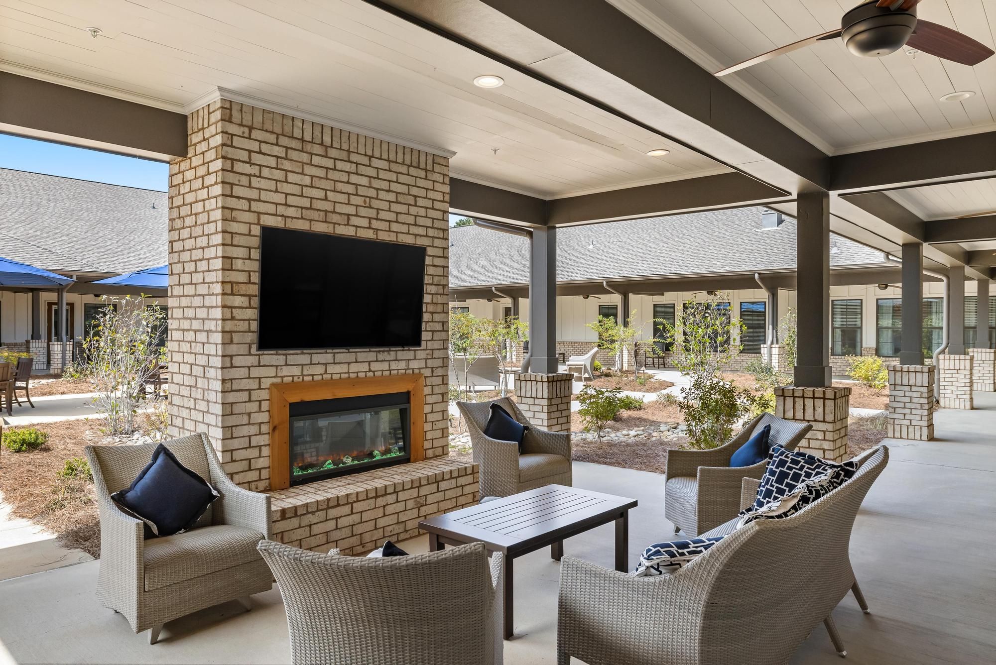The Preserve at Meridian outdoor courtyard with TVs and fireplaces