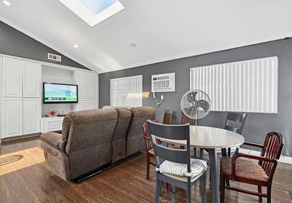 Comfortable community room for social gatherings and activities at Sunnyside Senior Apartments in San Dimas, CA