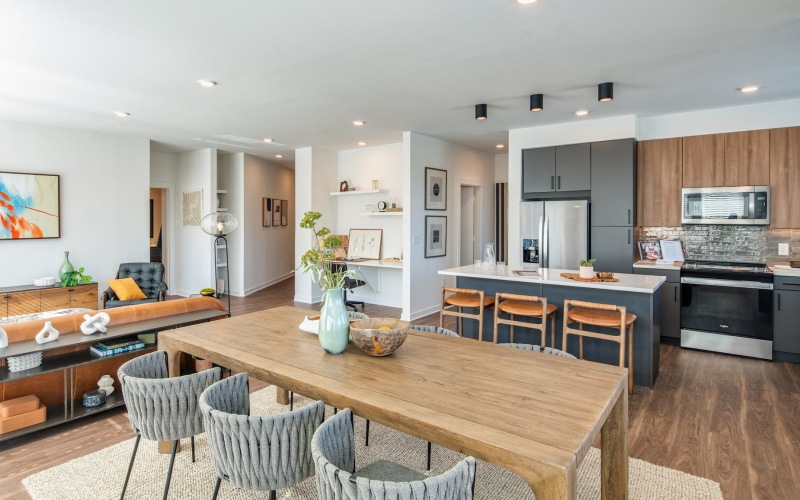a kitchen with wooden cabinets