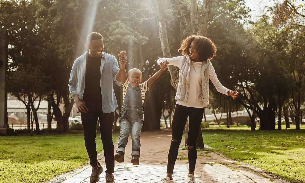 Family outside on a walking path