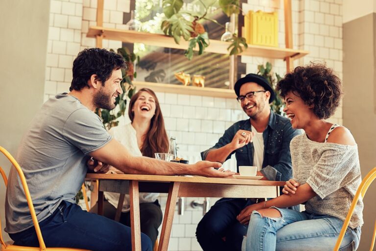 Friends hanging out at a table
