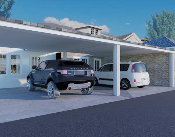 A black SUV is parked in a driveway next to a white van.