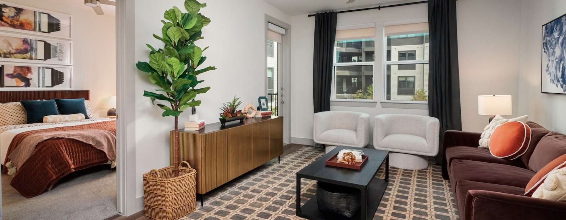living room area with view of bedroom 