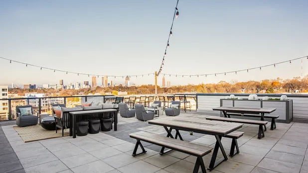 rooftop dining area with skyline view
