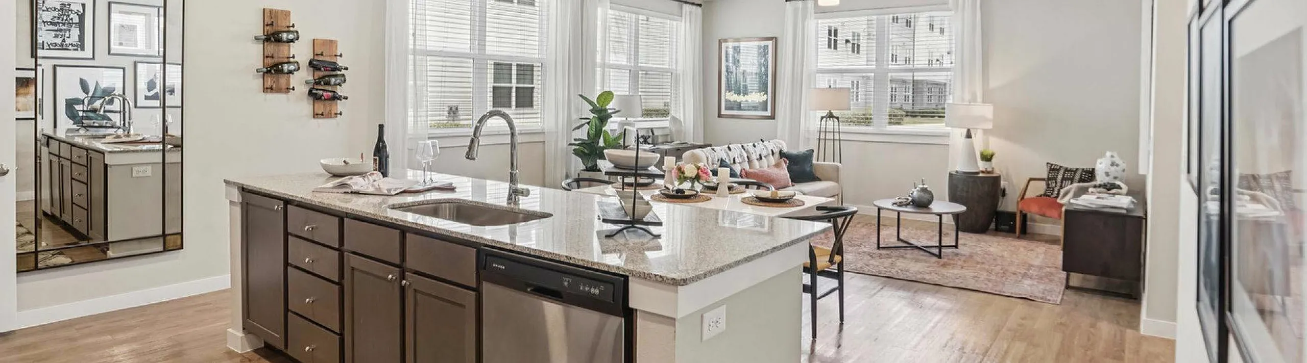 kitchen island and open living space in unit