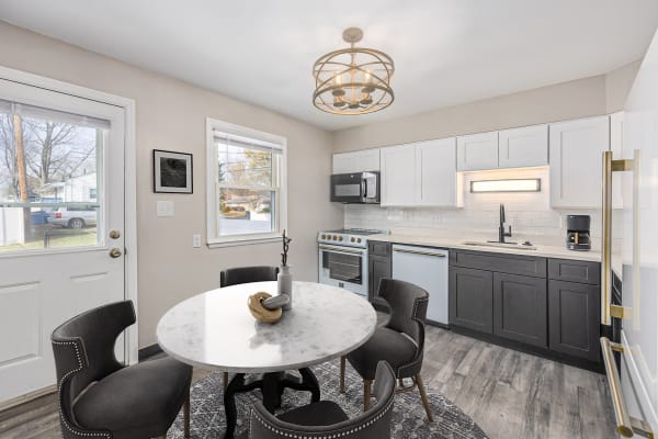photo of remodeled modern kitchen with new cabinets, countertops and appliances