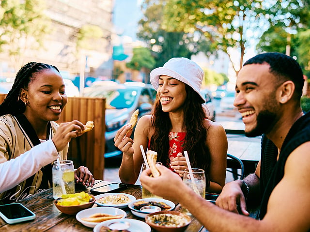 friends eating in downtown sugar hill