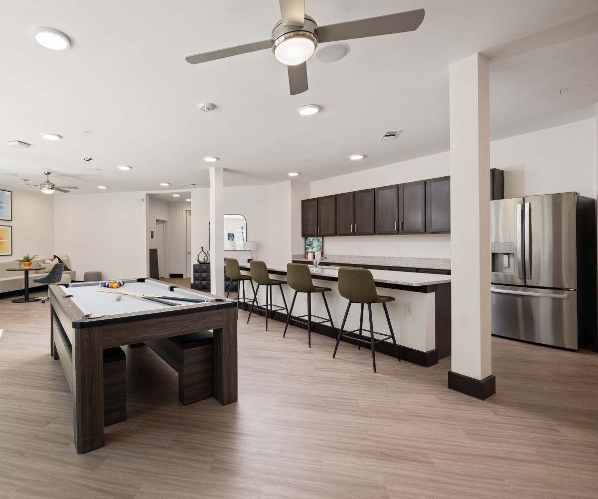 Community clubhouse with kitchen at Henderson on Reinli in Austin, Texas