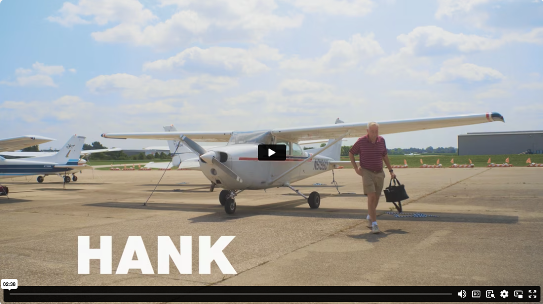 Hank in front of his plane