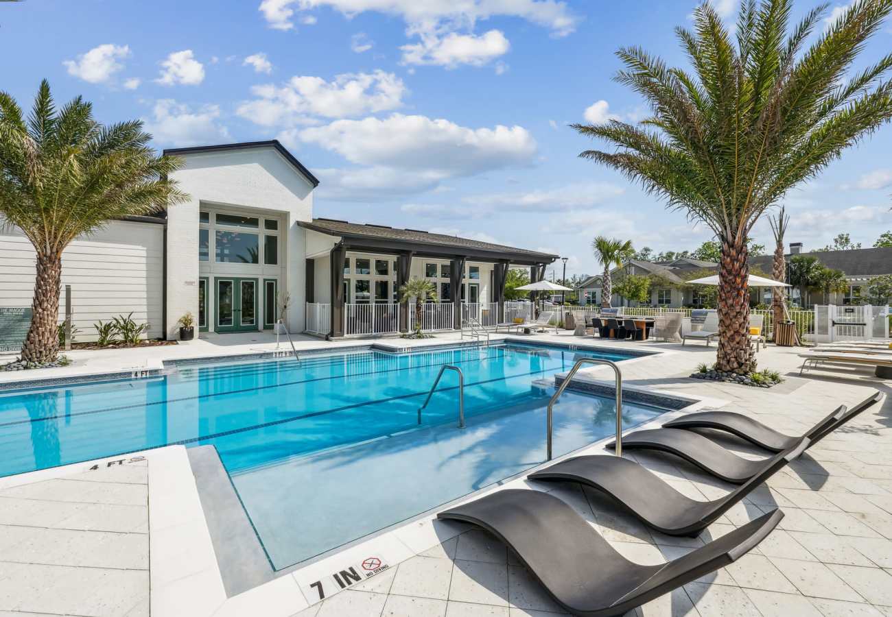 Relaxing resort-style swimming pool at The Maggie Flats in Jacksonville, Florida
