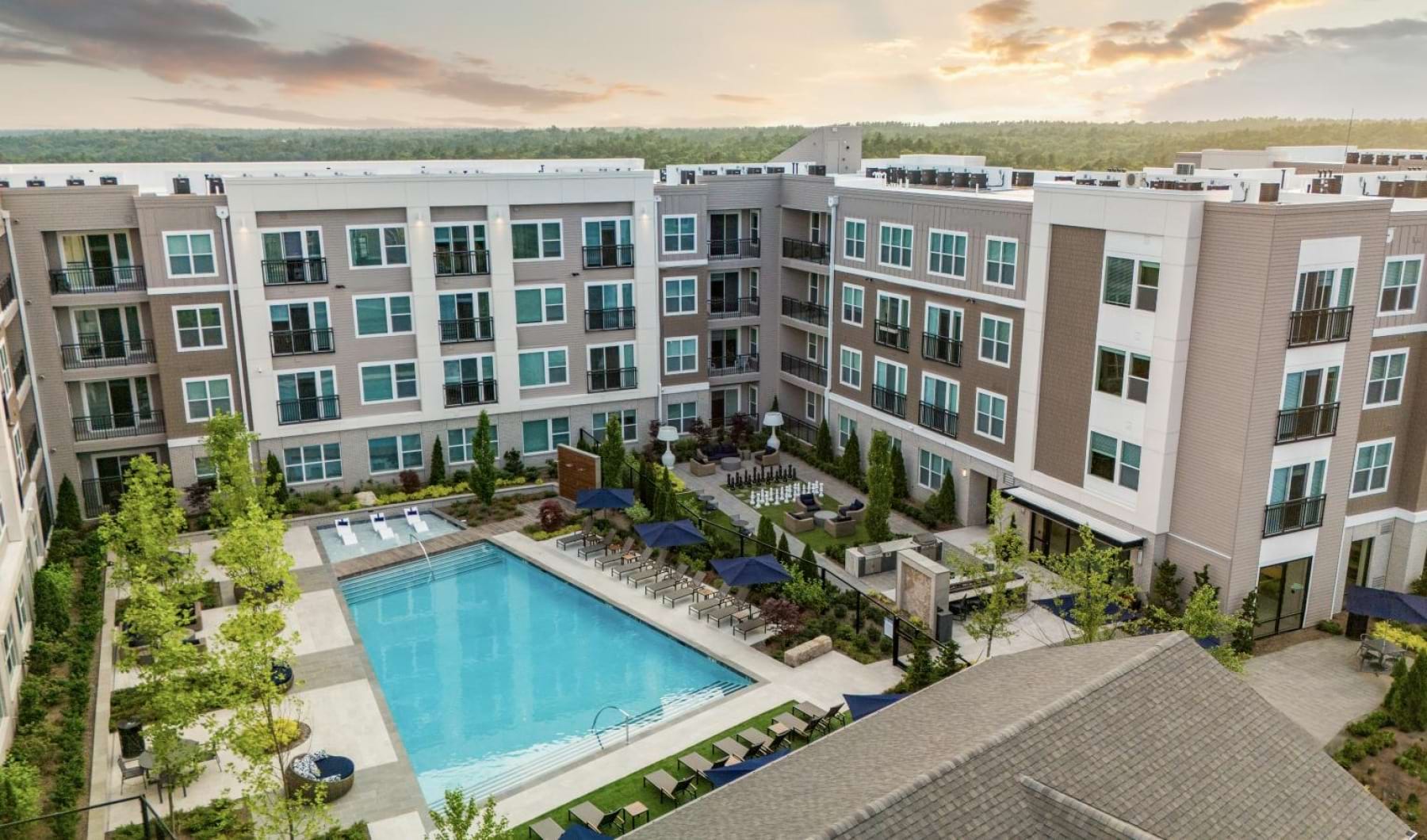 a building with a pool in front