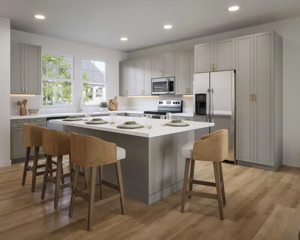 Modern kitchen with gray cabinets, stainless steel appliances, a large island with a white countertop, and four woven barstools on light wood flooring.