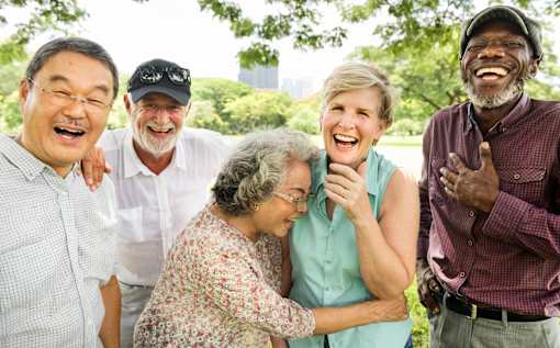 Group of seniors enjoying social activities at Sage 5430 senior living community in Norcross, GA