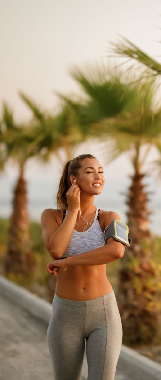 Fitness Girl running on track