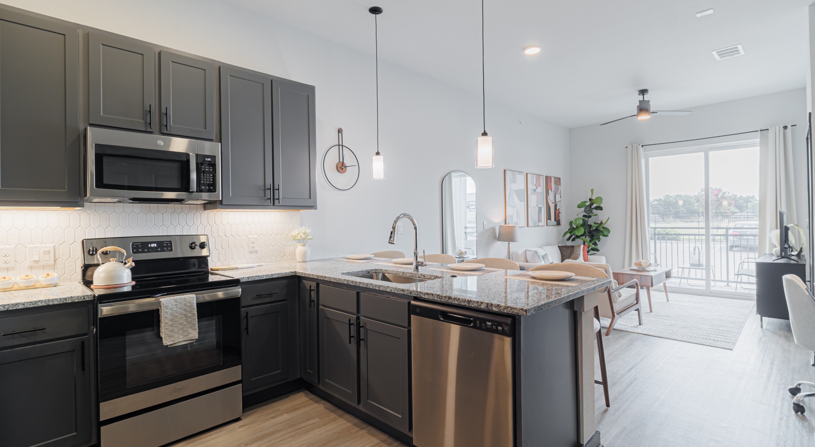 A2 1 Bed 1 Bath Kitchen: kitchen with designer lighting, stainless steel appliances