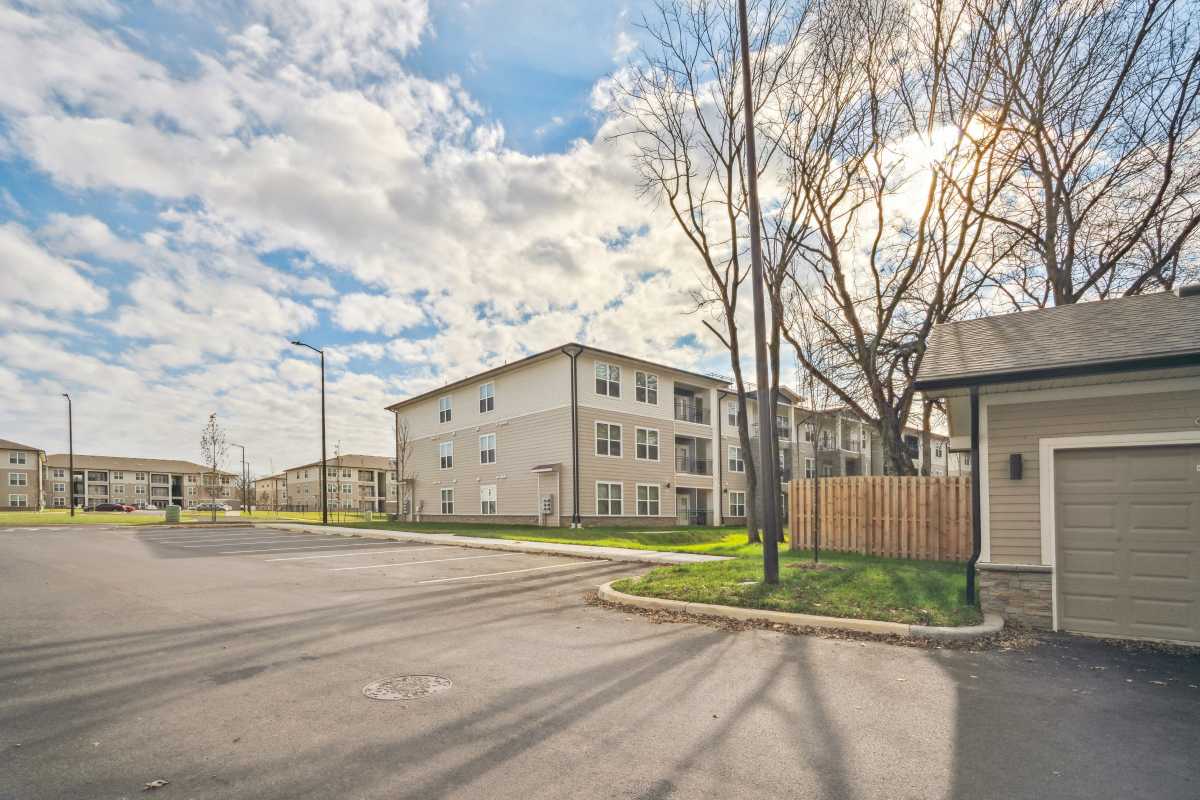 Exterior of the apartments from street at Lone Oak Meadows in Louisville, Kentucky