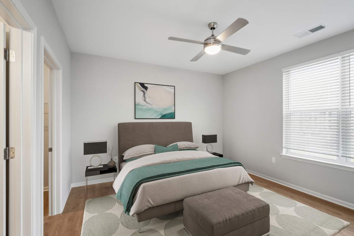 Bedroom with ceiling fan at Lone Oak Meadows in Louisville, Kentucky