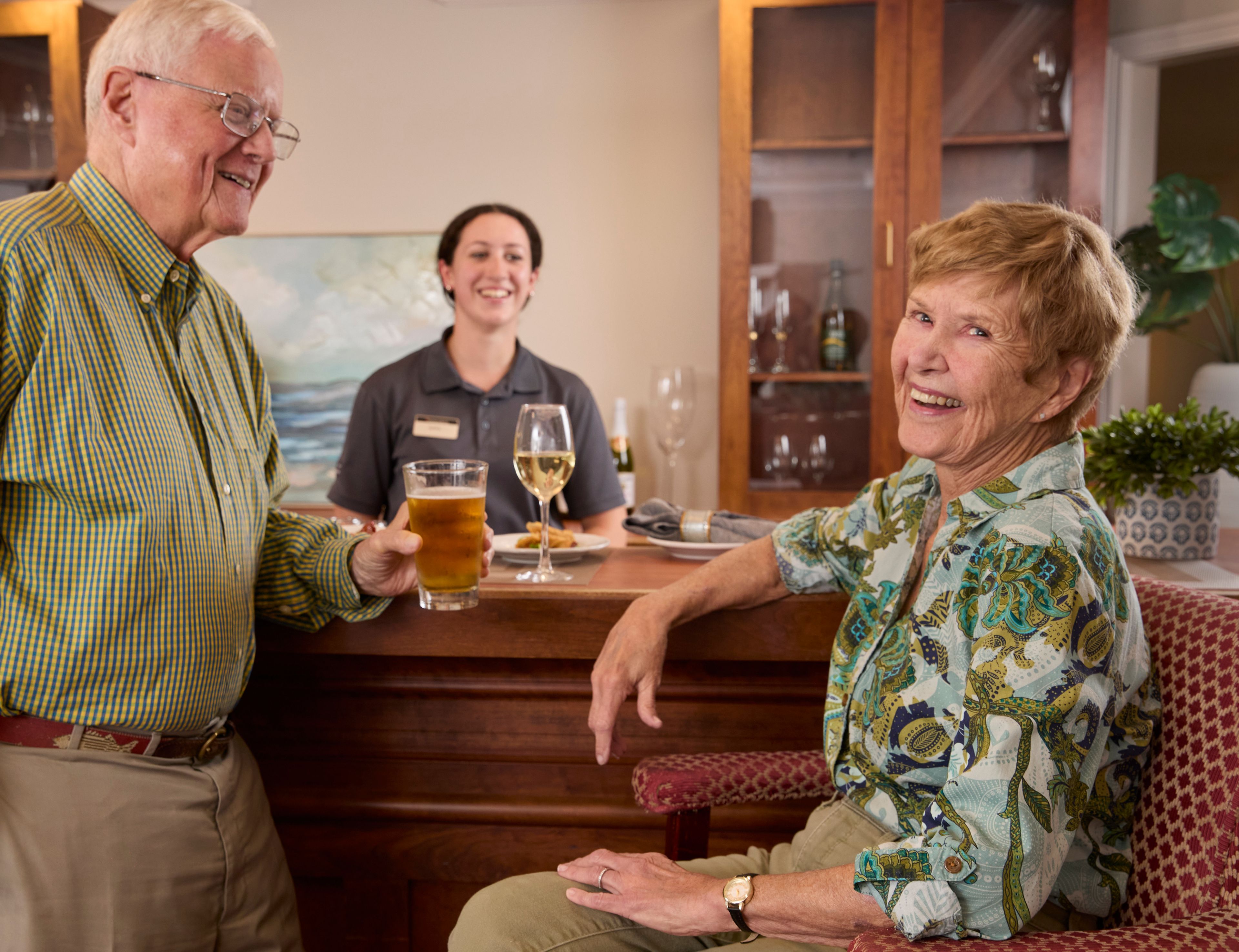 A couple grabbing a drink at a bar
