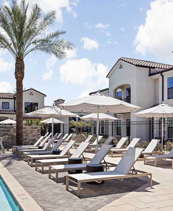 Chaise longues at the pool at Stella, San Tan Valley Arizona